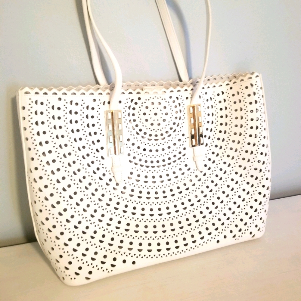 Madison West cutout bag